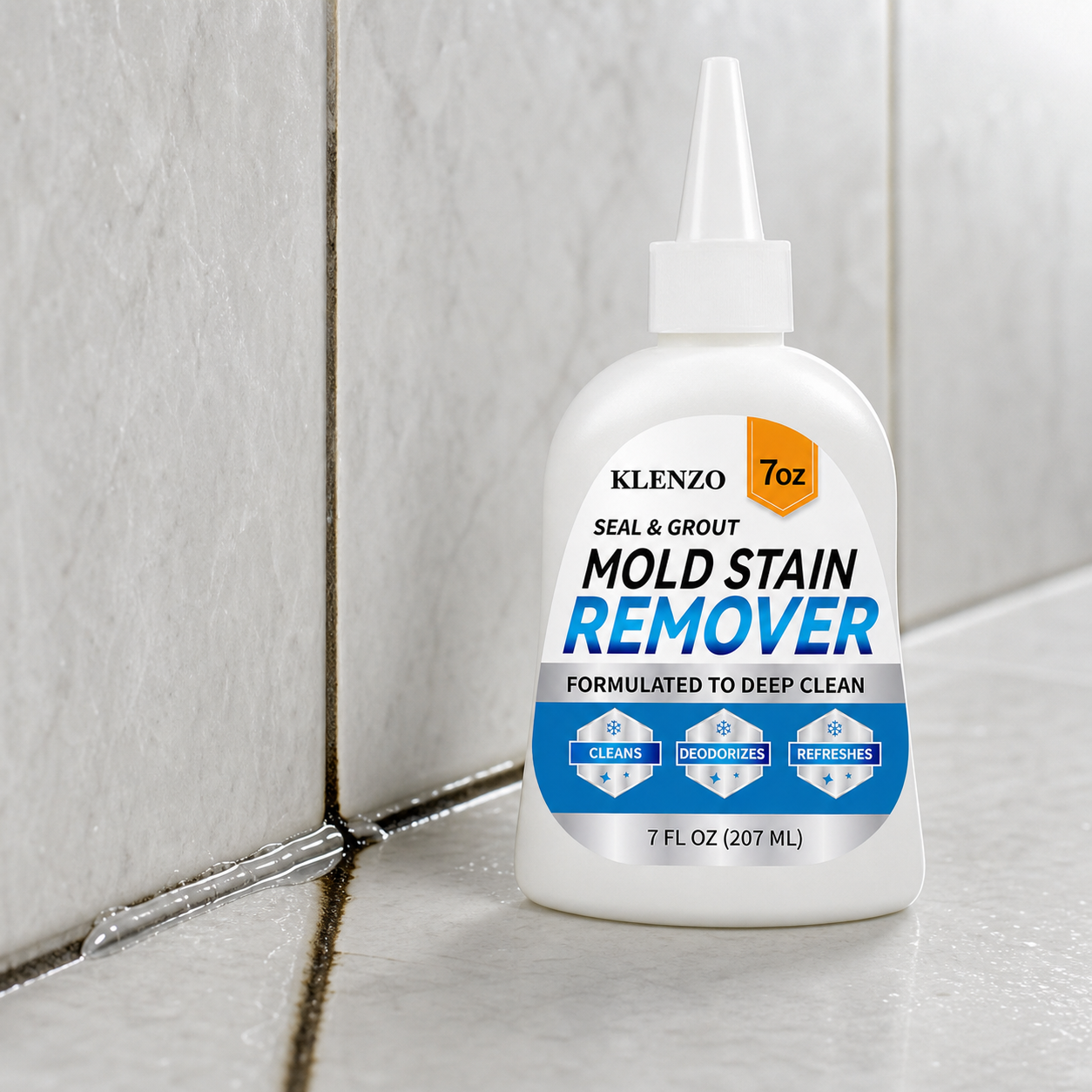 Klenzo bottle beside a treated shower grout line