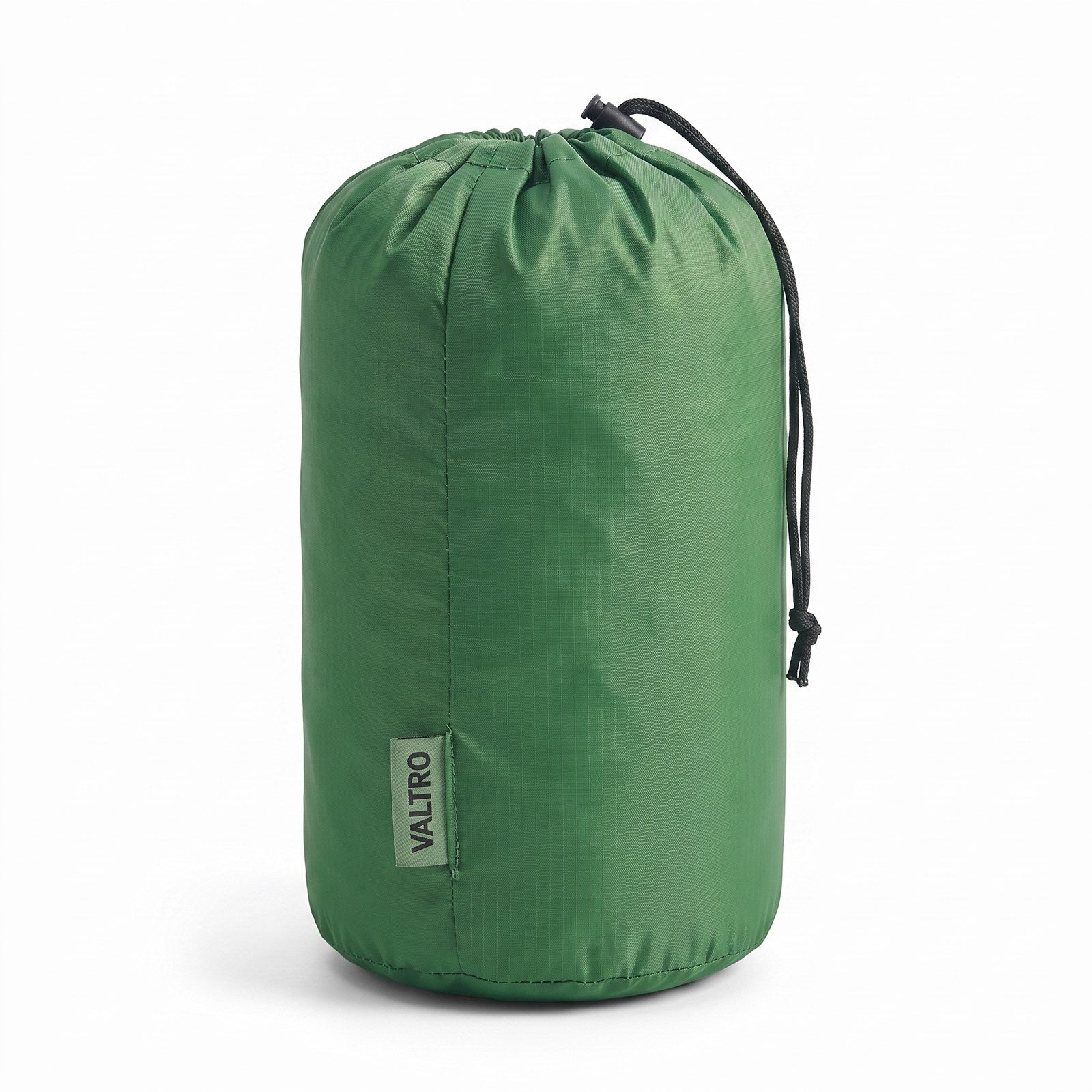 Green Valtro sleeping pad packed inside its carry bag