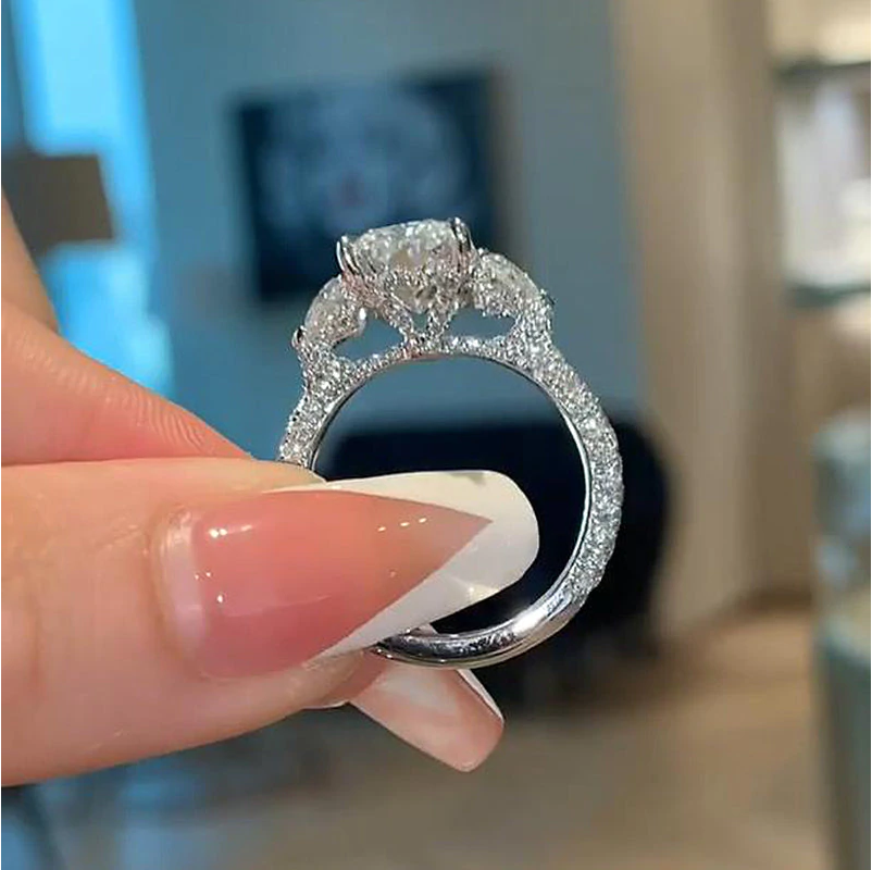 Radiant Cut Three Stone Engagement Ring With Two Heart Cut Side Stones shine of diamond