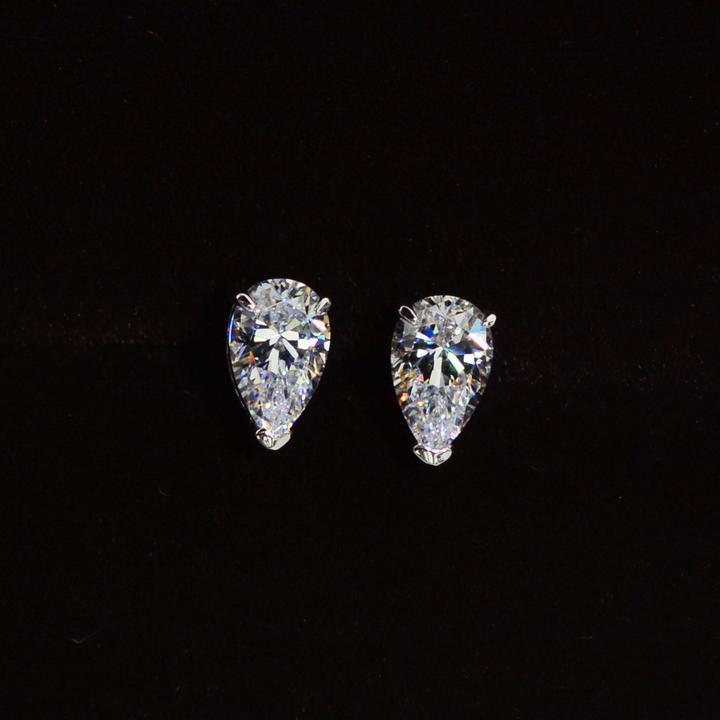 Pear Cut Stud Earrings in Sterling Silver Shineofidamond