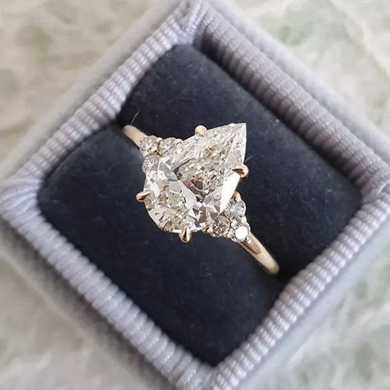 Pear Cut Sterling Silver Engagement Ring with Three Stone hot