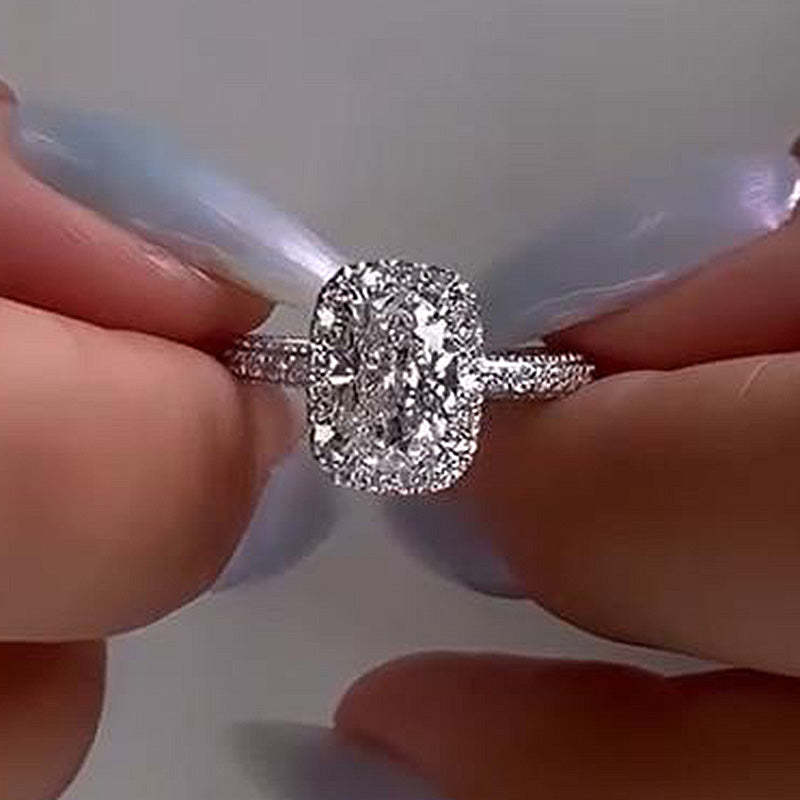 Unique Halo Oval Cut Engagement Ring In Sterling Silver shineofdiamond