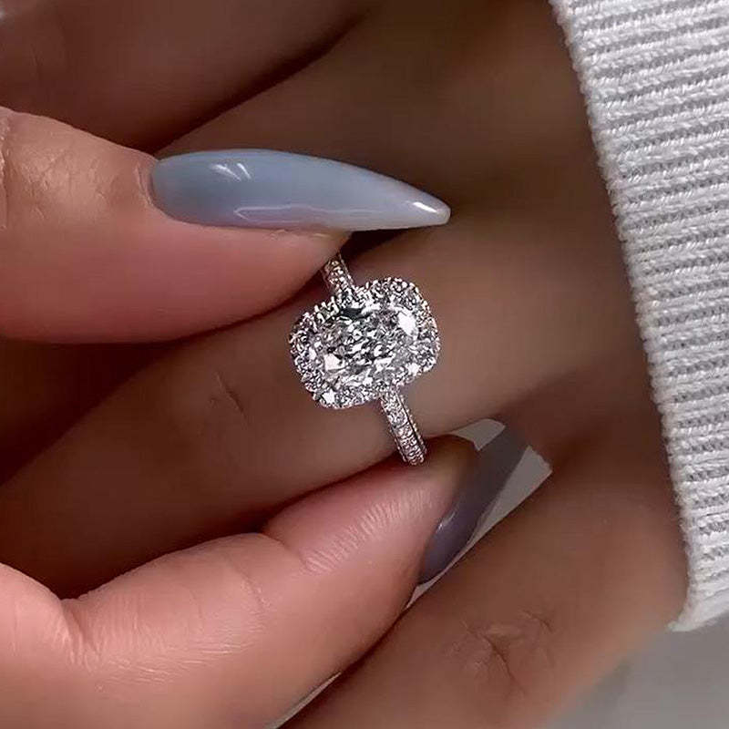 Unique Halo Oval Cut Engagement Ring In Sterling Silver shineofdiamond