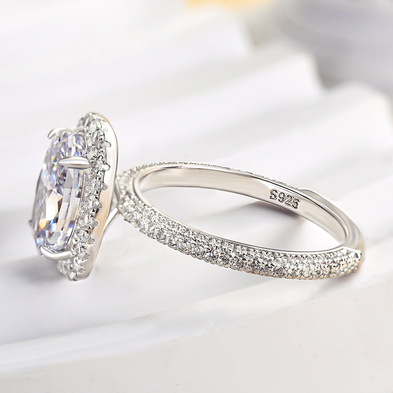 Unique Halo Oval Cut Engagement Ring In Sterling Silver shineofdiamond