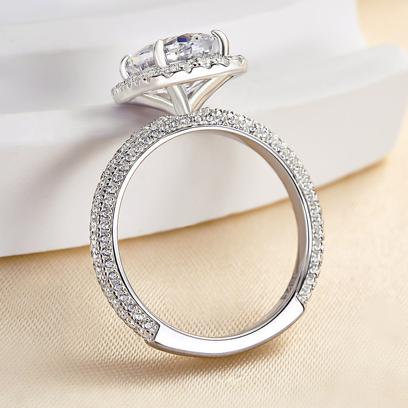 Unique Halo Oval Cut Engagement Ring In Sterling Silver shineofdiamond