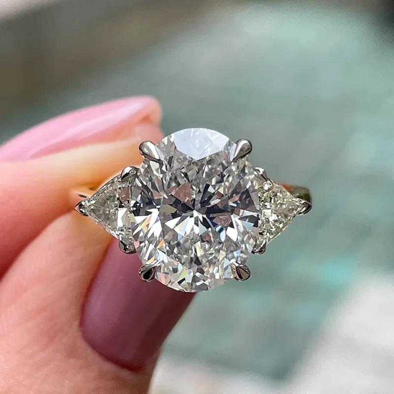 Two-Tone Oval Cut Three Stone Engagement Ring In Sterling Silver shineofdiamond