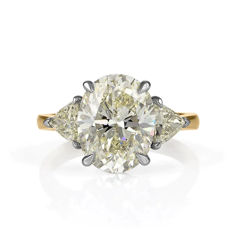 Two-Tone Oval Cut Three Stone Engagement Ring In Sterling Silver shineofdiamond