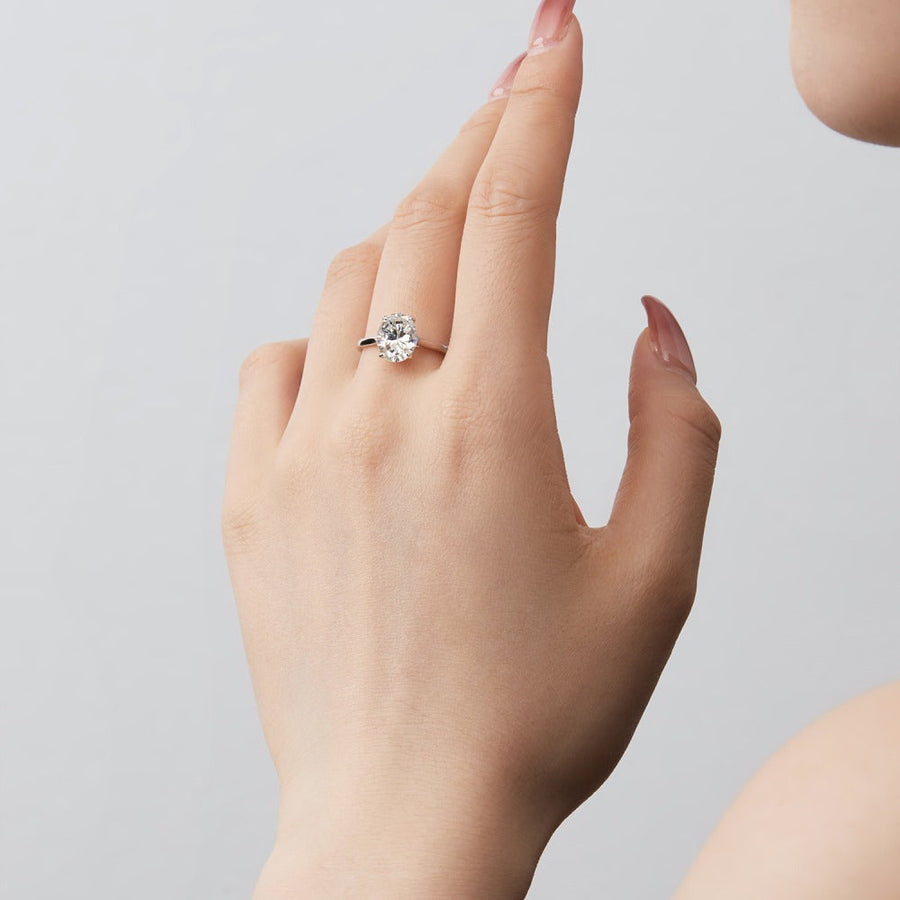 Oval Cut Solitaire Engagement Ring In Sterling Silver Shineofdiamond