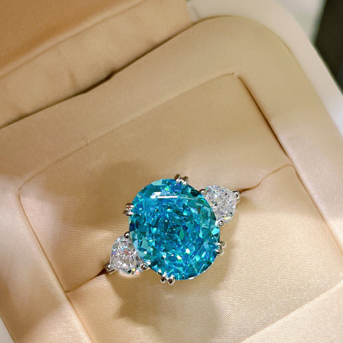 Greenish Blue Oval Cut Engagement Ring in Sterling Silver shine of diamond