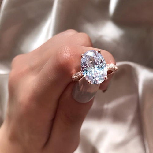 Rose Gold Oval Cut Sterling Silver Engagement Ring Shineofidamond