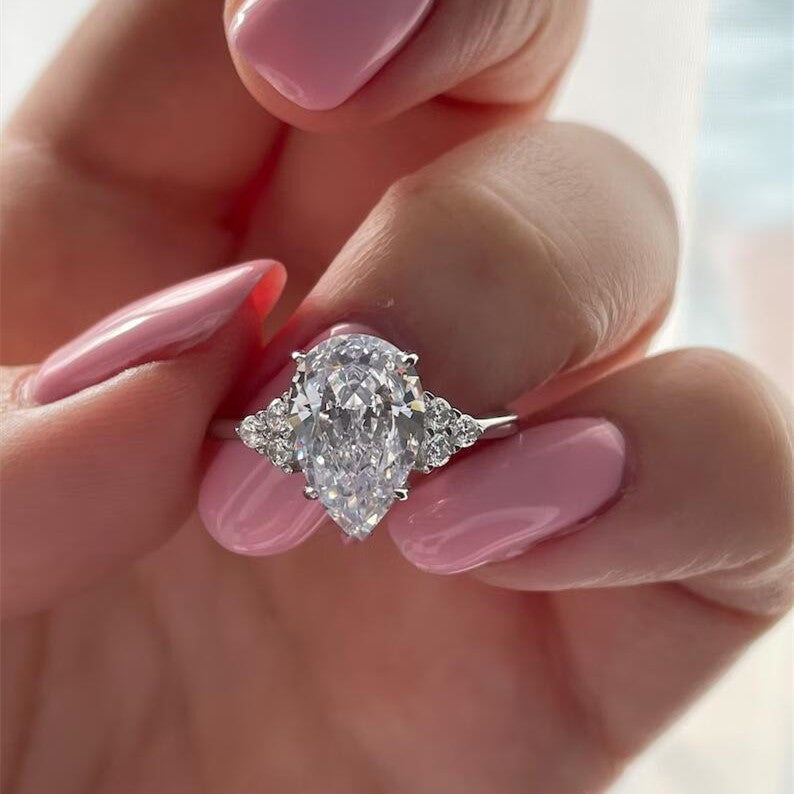 Pear Cut Sterling Silver Engagement Ring with Three Stone hot