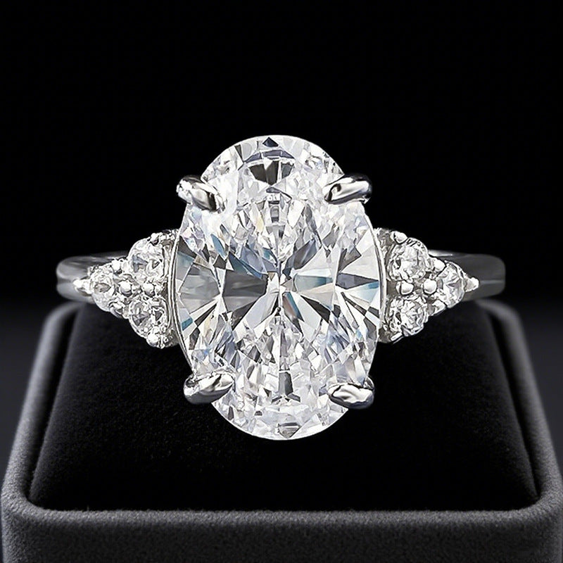 Gorgeous Golden Tone Oval Cut Engagement Ring In Sterling Silver shine of diamond