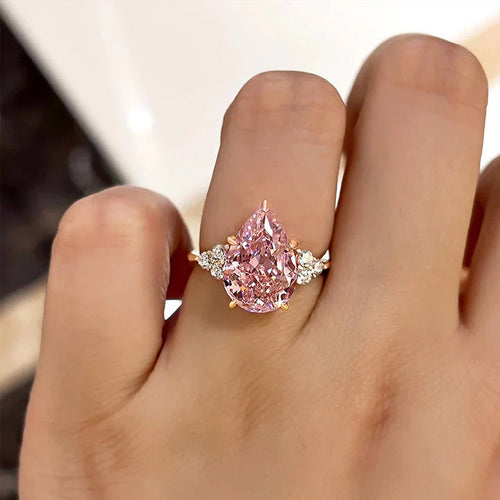 Pear Cut Pink Gemstone Three Stone Engagement Ring In Sterling Silver shine