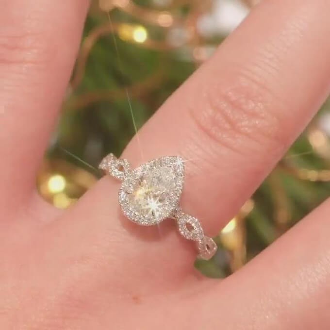 Pear Cut Sterling Silver Twisted Halo Engagement Ring Shineofidamond