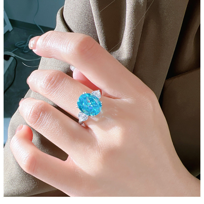 Greenish Blue Oval Cut Engagement Ring in Sterling Silver shine of diamond