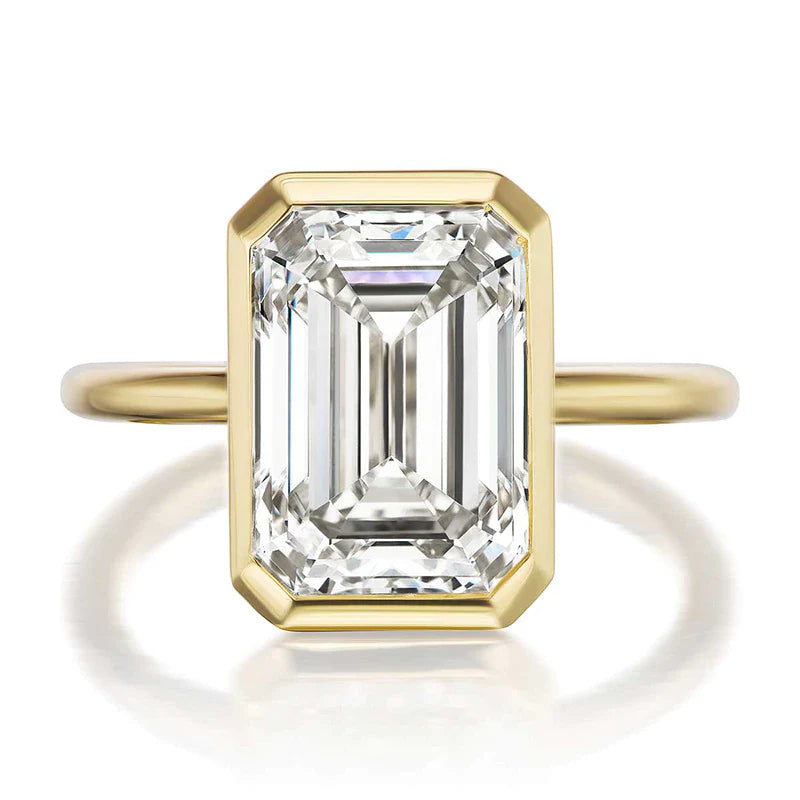 Elegant Emerald Cut Sterling Silver Bezel Engagement Ring In Golden Tone Shineofdiamond