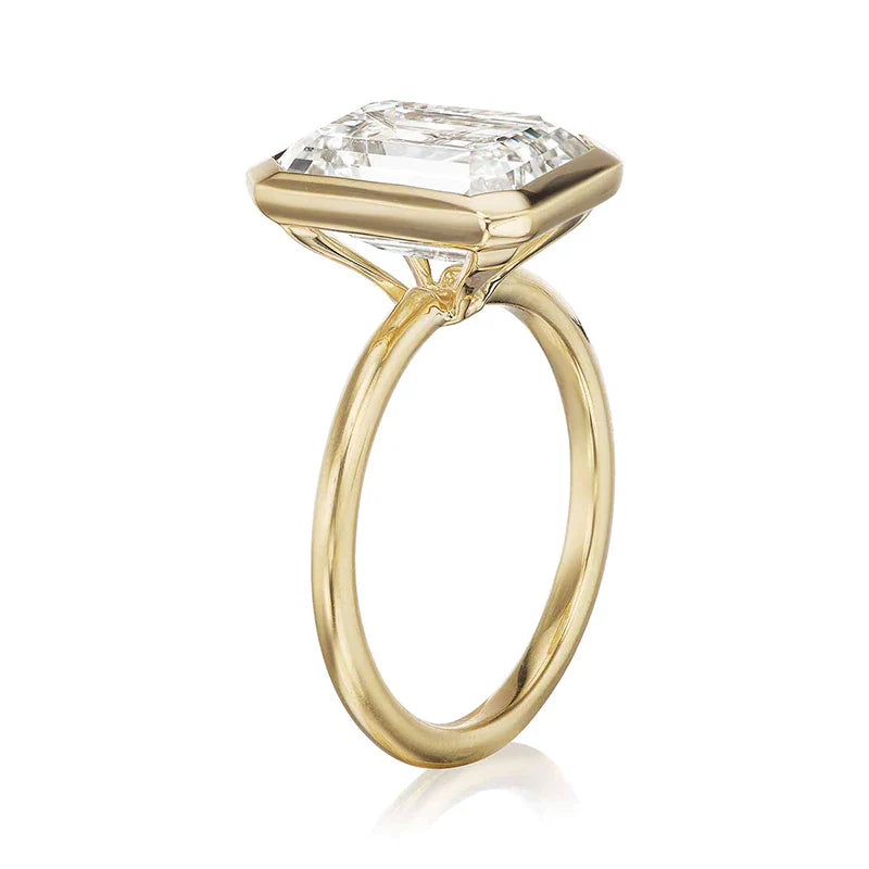 Elegant Emerald Cut Sterling Silver Bezel Engagement Ring In Golden Tone Shineofdiamond