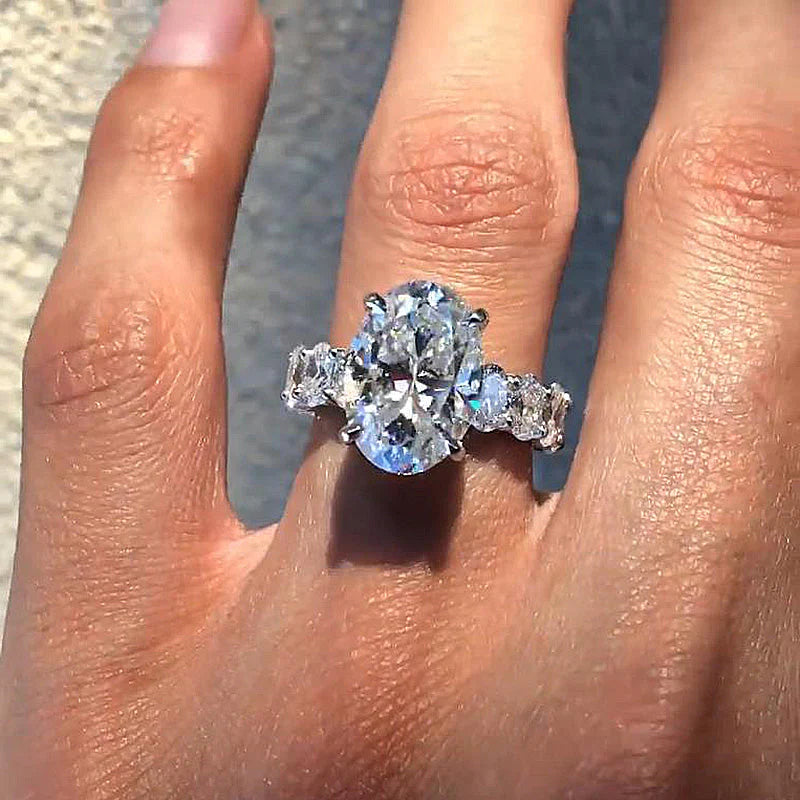 Stunning Oval Cut 4 Prong Engagement Ring In Sterling Silver shine of diamond