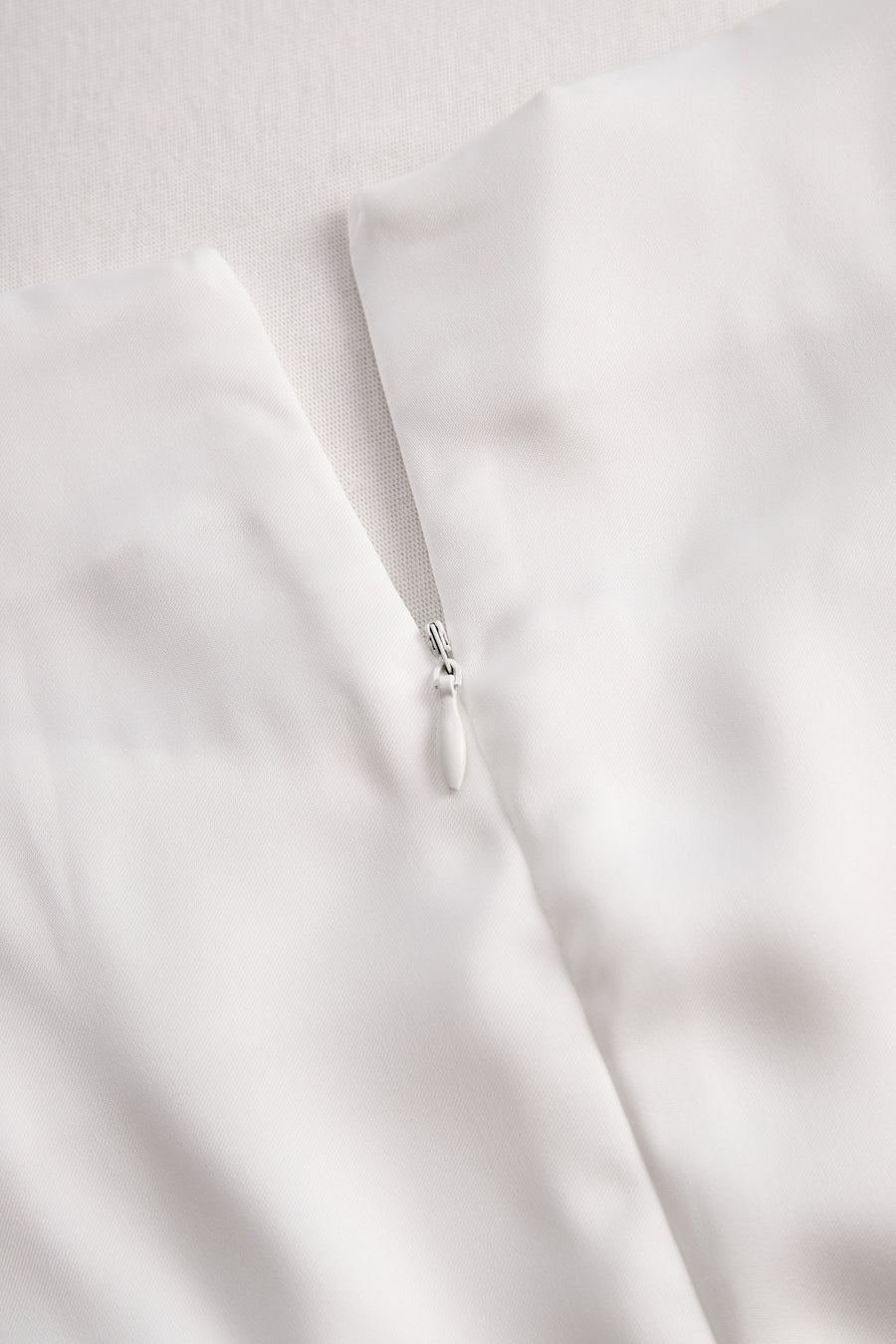 Elegant White Draped Top with Button Detail HWT