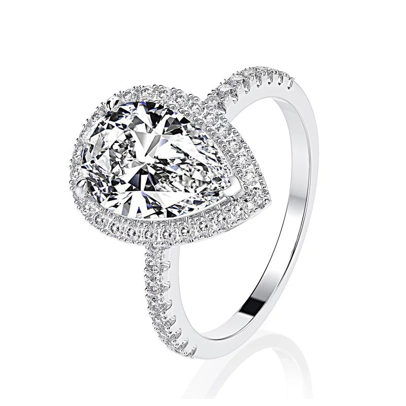 Pear Cut Halo 3 Prong Engagement Ring In Sterling Silver shineofdiamond