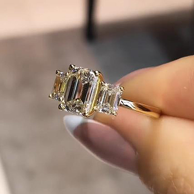 Stunning Golden Tone Emerald Cut Three Stone Engagement Ring In Sterling Silver Juluro