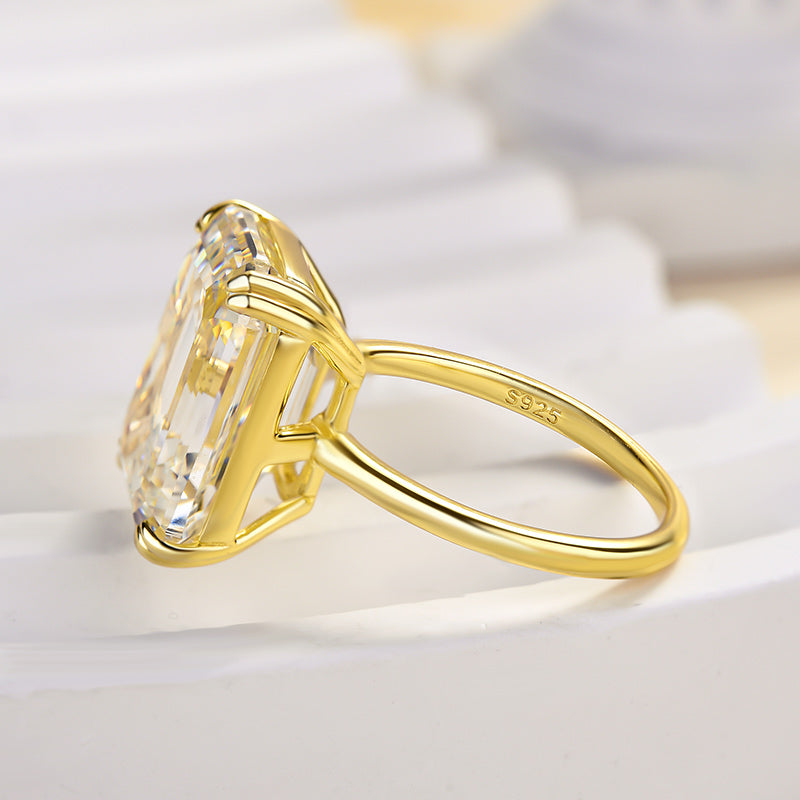 Luxurious Golden Emerald Cut Engagement Ring In Sterling Silver shine of diamond