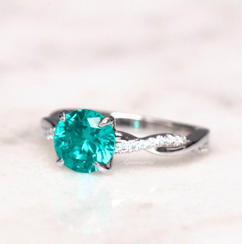Twisted Band Round Cut Paraiba Tourmaline Ring in Sterling Silver shine of diamond