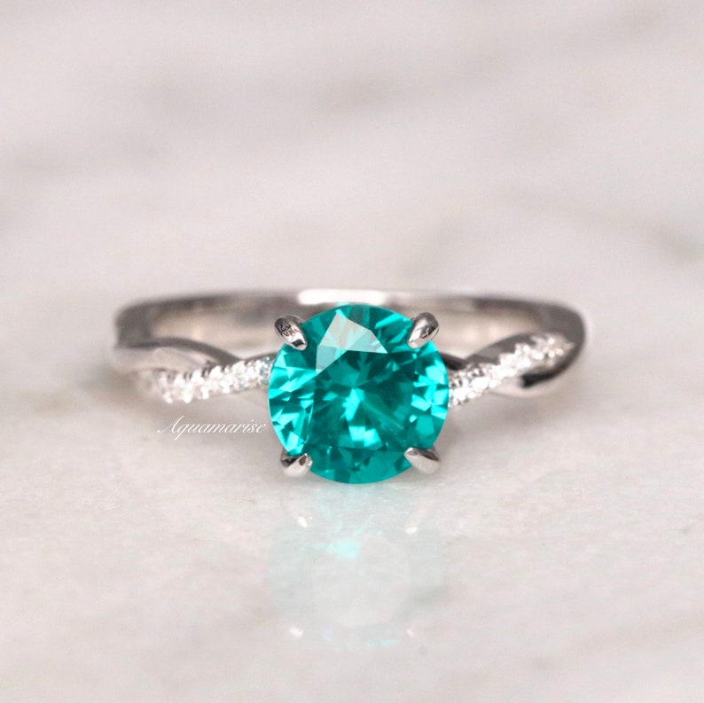 Twisted Band Round Cut Paraiba Tourmaline Ring in Sterling Silver shine of diamond