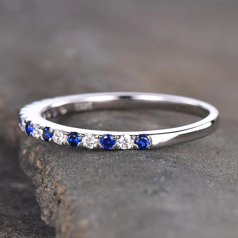 Blue And White Design Half Eternity Wedding Band In Sterling Silver shine of diamond