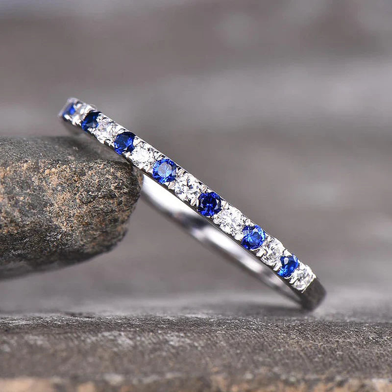 Blue And White Design Half Eternity Wedding Band In Sterling Silver shine of diamond