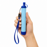AI-generated illustrative scale example of an Aquor filter straw held in an adult hand