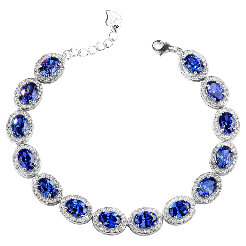 Oval Cut Sapphire Tennis Bracelet in Sterling Silver Shineofdiamond