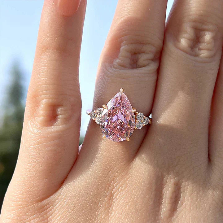 Pear Cut Pink Gemstone Three Stone Engagement Ring In Sterling Silver shine