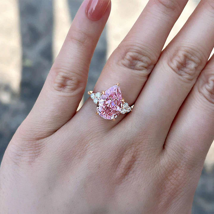 Pear Cut Pink Gemstone Three Stone Engagement Ring In Sterling Silver shine