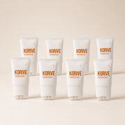 Korive Hair Growth Serum 7 bottle bundle studio photograph