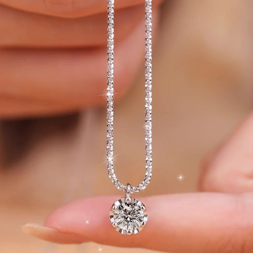 Round Cut Moissanite Pendant Necklace in Sterling Silver Shineofidamond
