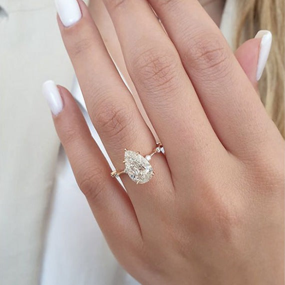 Distance Band Pear Cut Engagement Ring in Sterling Silver Shineofdiamond
