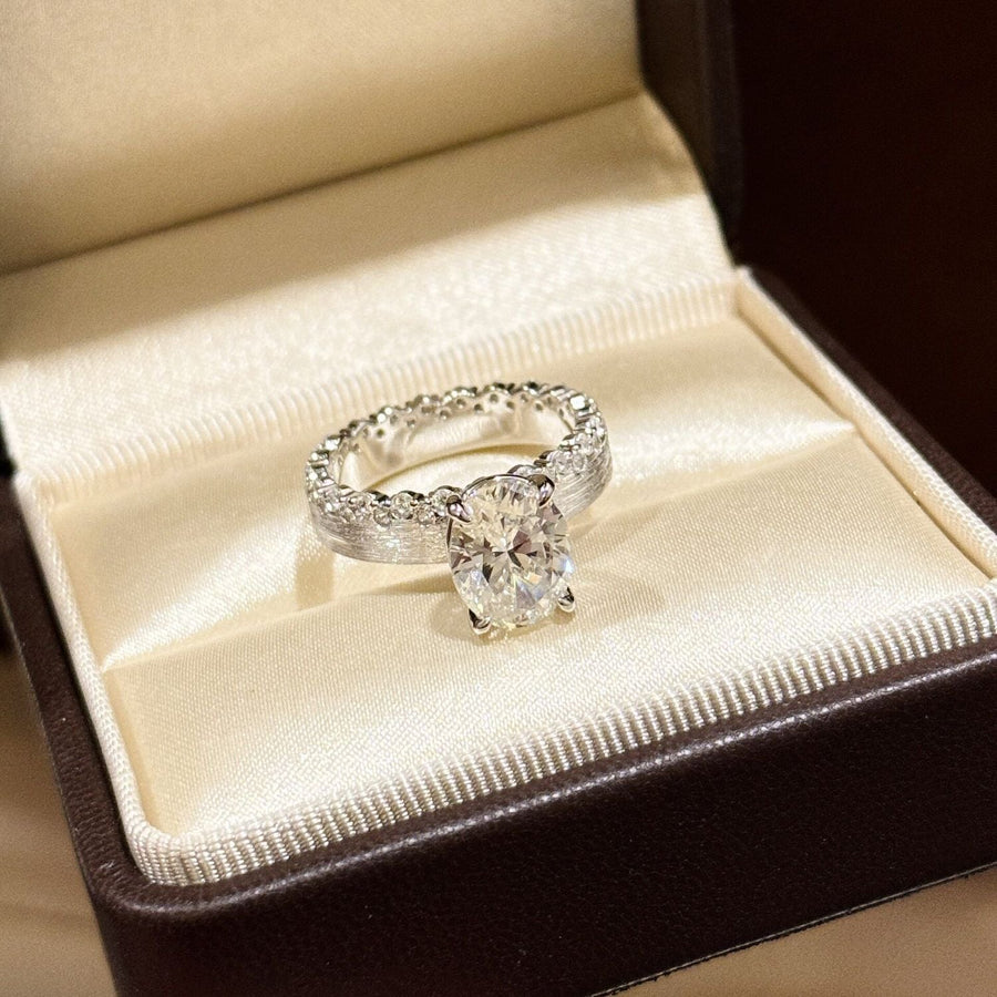 Elegant Textured Band & Side Stones Solitaire Oval Cut Sterling Silver Ring Shine of Diamond