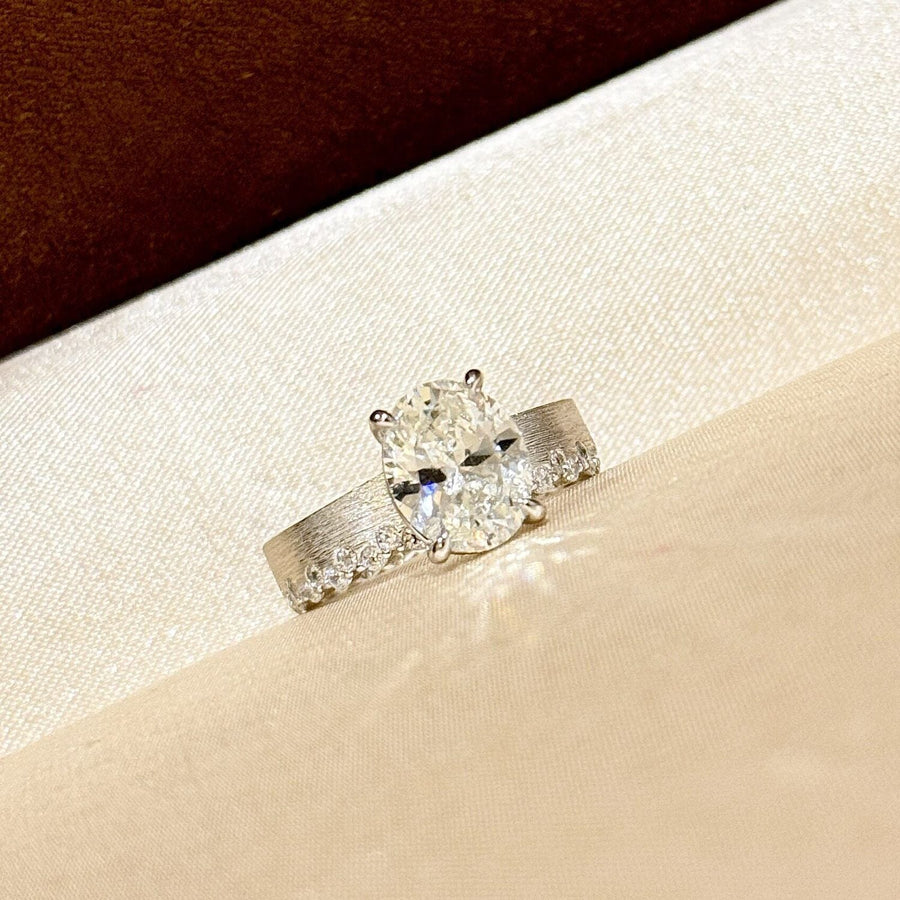 Elegant Textured Band & Side Stones Solitaire Oval Cut Sterling Silver Ring Shine of Diamond
