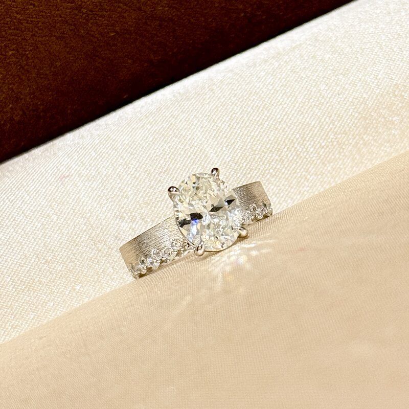 Elegant Textured Band & Side Stones Solitaire Oval Cut Sterling Silver Ring Shine of Diamond