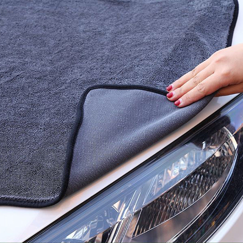 Velcura cloth wiping dust from a car surface
