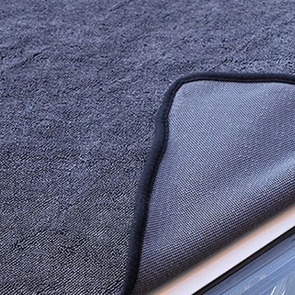 Velcura cloth wiping dust from a car surface